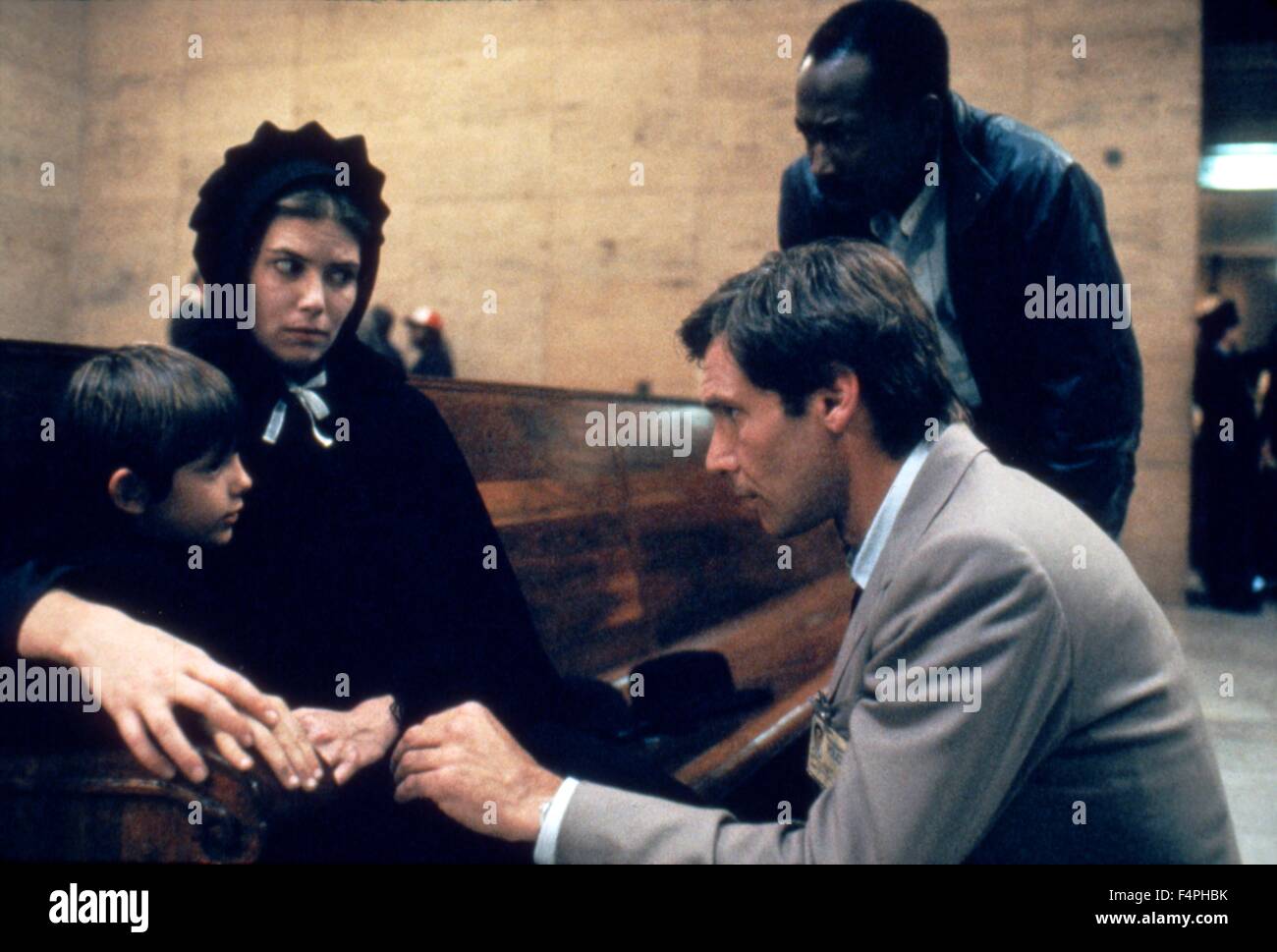 Lukas Haas, Kelly McGillis e Harrison Ford / testimonianza / 1985 diretto da Peter Weir Foto Stock