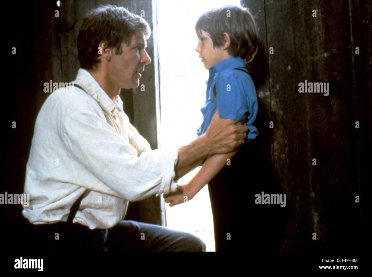 Harrison Ford e Lukas Haas / testimonianza / 1985 diretto da Peter Weir Foto Stock