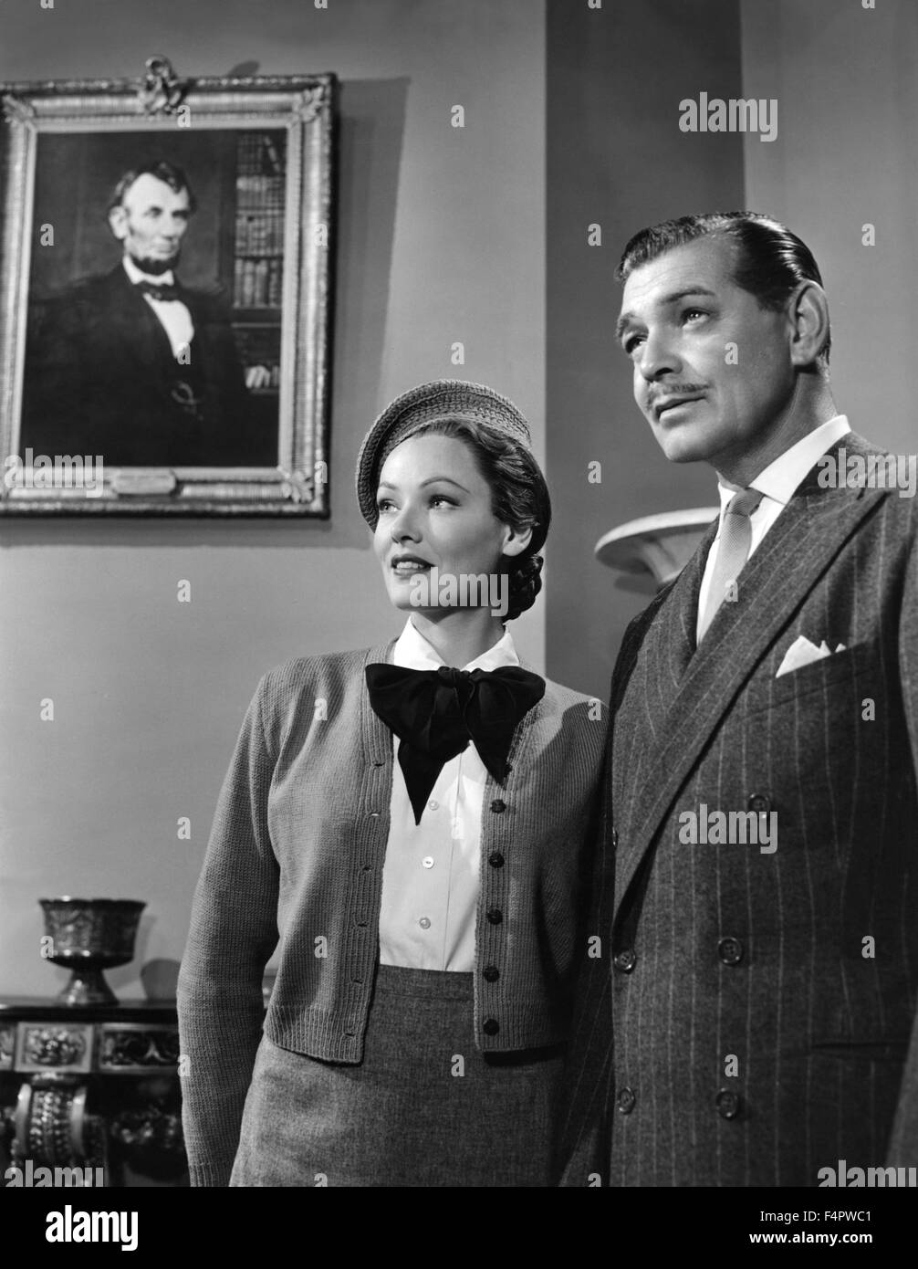 Gene e Tierney Clark Gable / Mai Lasciami andare / 1953 diretto da Delmer Daves [Metro Goldwyn Mayer Pictures] Foto Stock