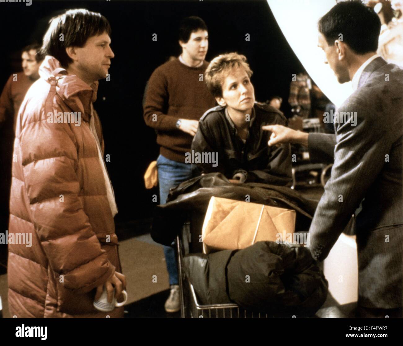 Sul set, Terry Gilliam con Kim Greist e Jonathan Pryce / Brasile / 1985 diretto da Terry Gilliam [Embassy International Pictures] Foto Stock