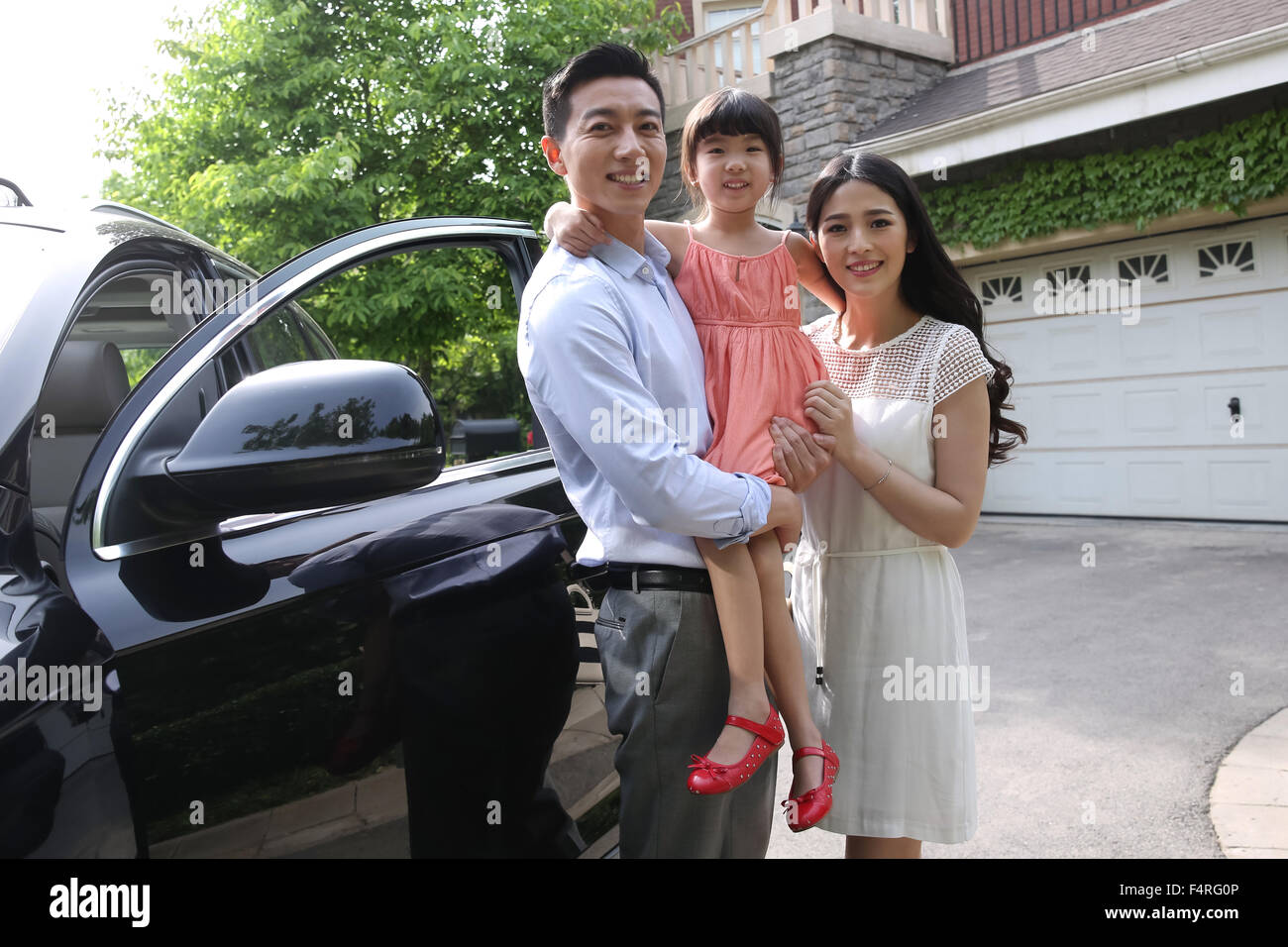 La famiglia felice viaggio in auto Foto Stock