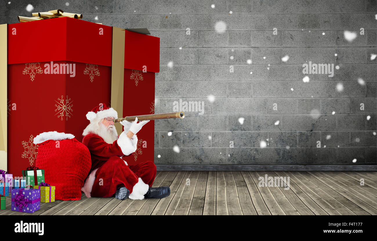 Immagine composita di santa guardando attraverso un telescopio Foto Stock