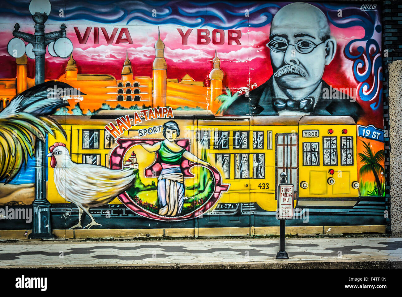 Arte di strada, murales e grafica a Ybor City, FL, l'ex 'Cigar capitale del mondo' insediata da immigrati cubani e spagnoli nella zona di Tampa Foto Stock