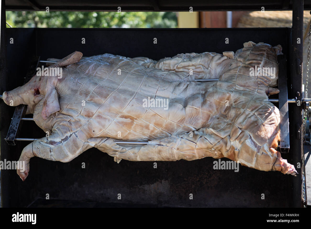 Maialino arrostito allo spiedo Foto Stock