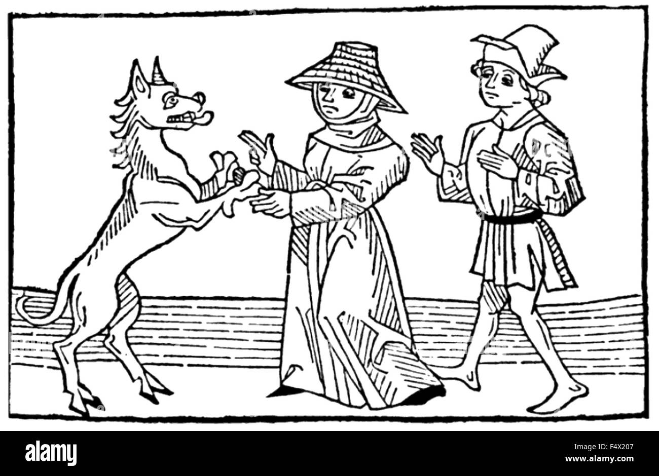 La stregoneria xilografia medievale di un maschio e femail streghe con il diavolo nella forma di un enorme cane. Nota i selvaggi zoccoli. Foto Stock