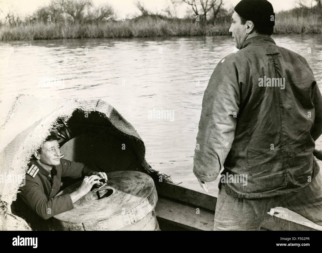 L'attore americano John Wayne in una scena del film "Il vicolo del sangue', STATI UNITI D'AMERICA Foto Stock