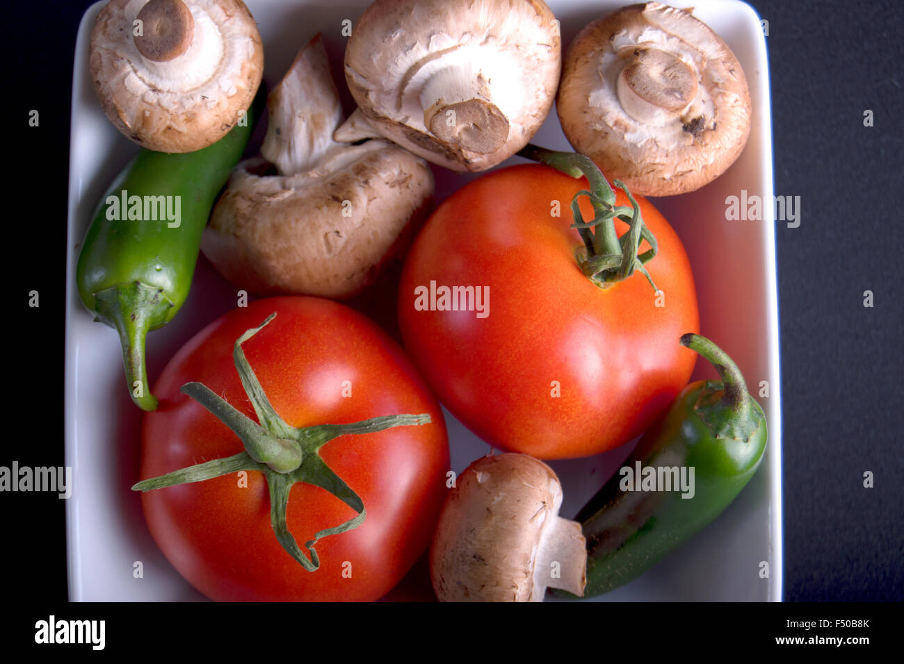 Pomodoro, funghi, peperoni Foto Stock