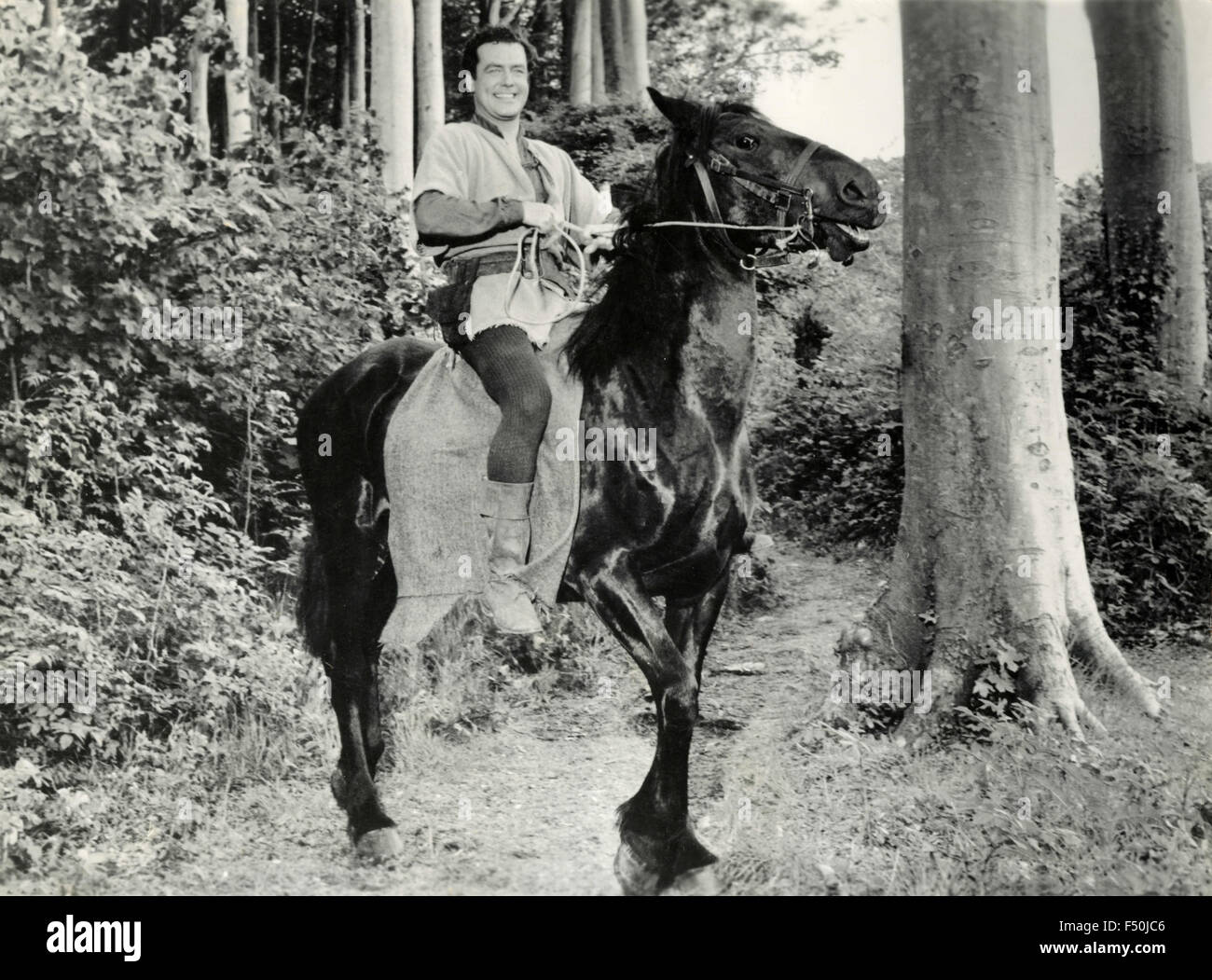 L'attore Richard Greene in una scena del film "parola di Foresta di Sherwood' , Regno Unito 1960 Foto Stock