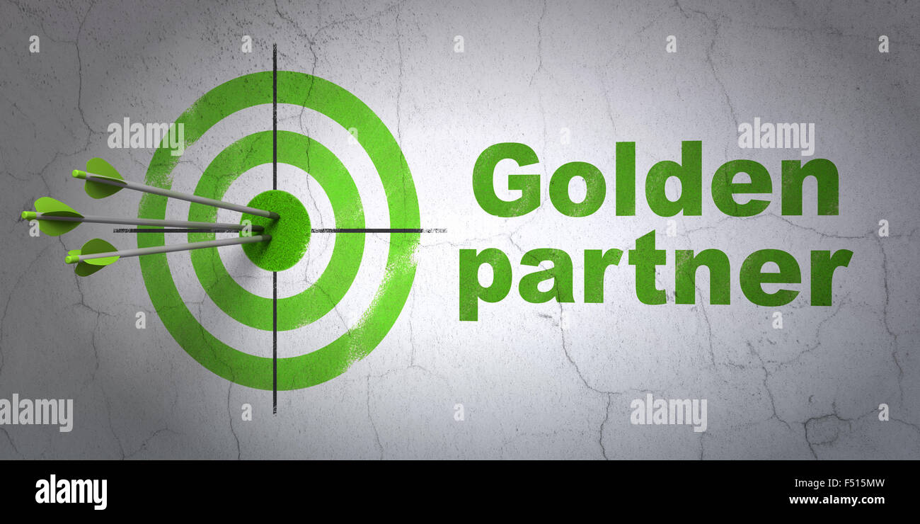 Il concetto di business: target e partner d'oro su sfondo a parete Foto Stock