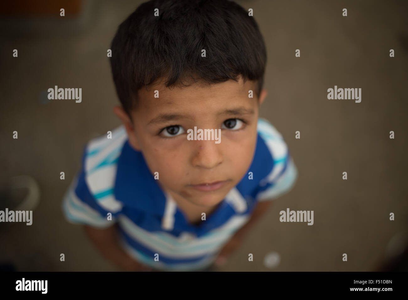 Rifugiato siriano nel centro UNCHR a Tripoli in attesa di registrazione e le cure. Tripoli, Libano 2015 Foto Stock