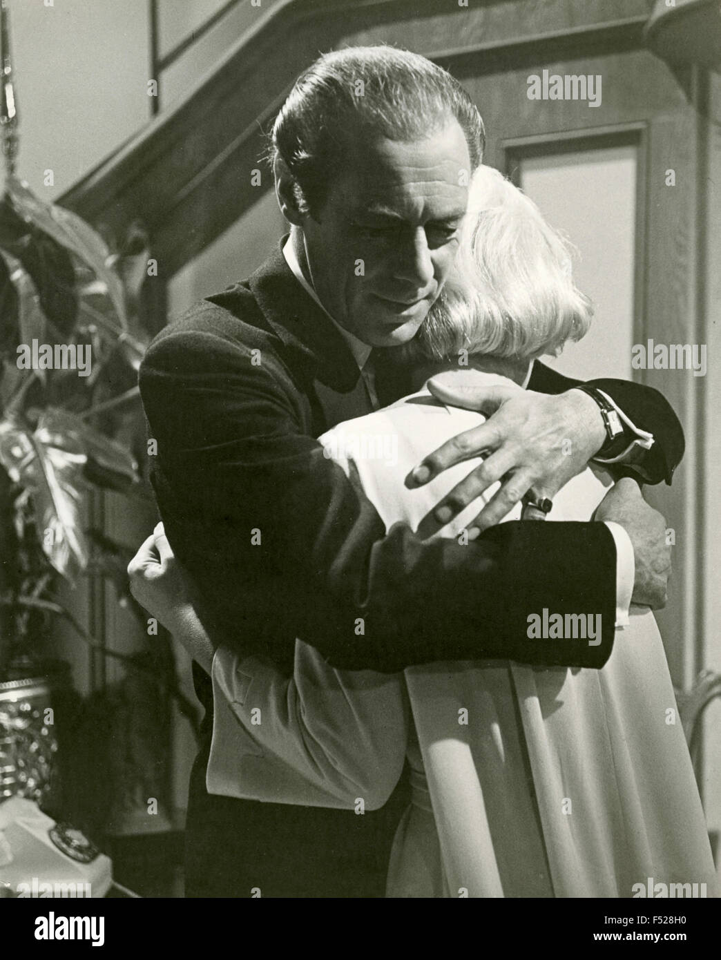 L'attore Rex Harrison in una scena del film 'Midnight Lace", STATI UNITI D'AMERICA Foto Stock
