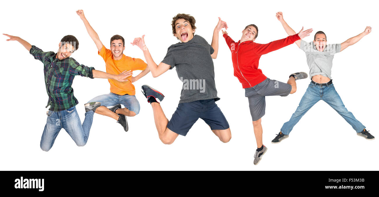 Un gruppo di adolescenti di felice jumping isolato in bianco Foto Stock