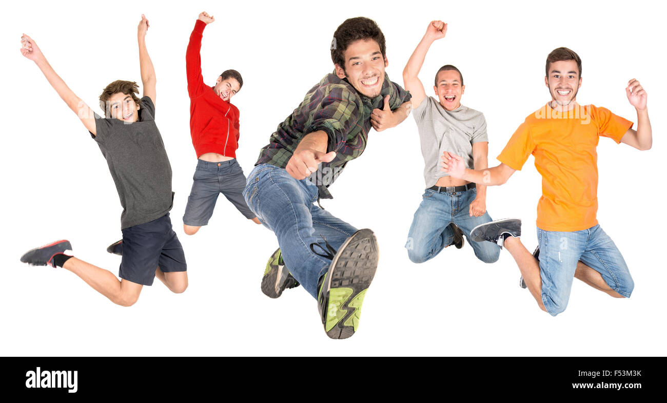 Un gruppo di adolescenti di felice jumping isolato in bianco Foto Stock