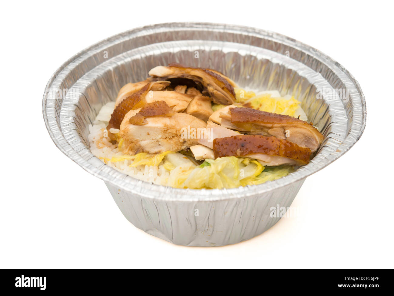 La forma rotonda scatola di pranzo di fette di pollo su bianco con tracciato di ritaglio Foto Stock
