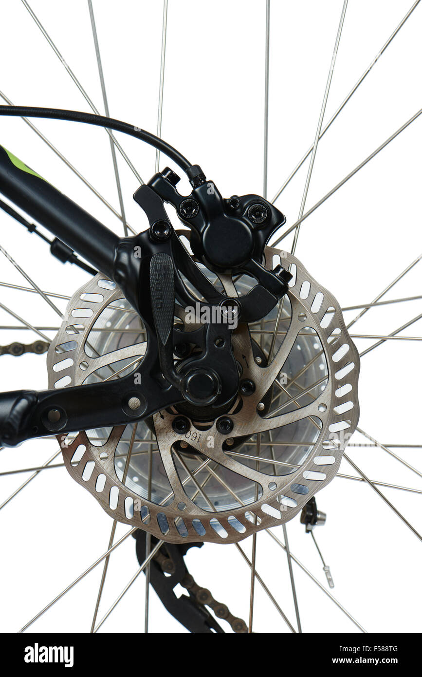 Parte posteriore del freno a dischi idraulico rotore e di mountain bike (MTB), isolata su bianco Foto Stock