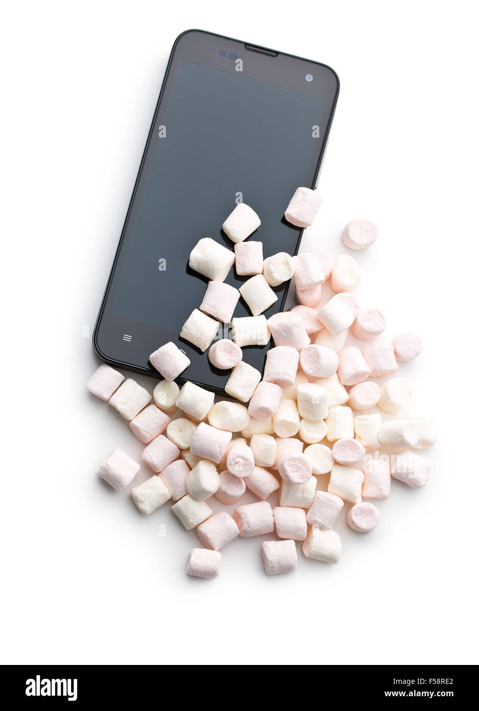 Smartphone e marshmallows su sfondo bianco Foto Stock