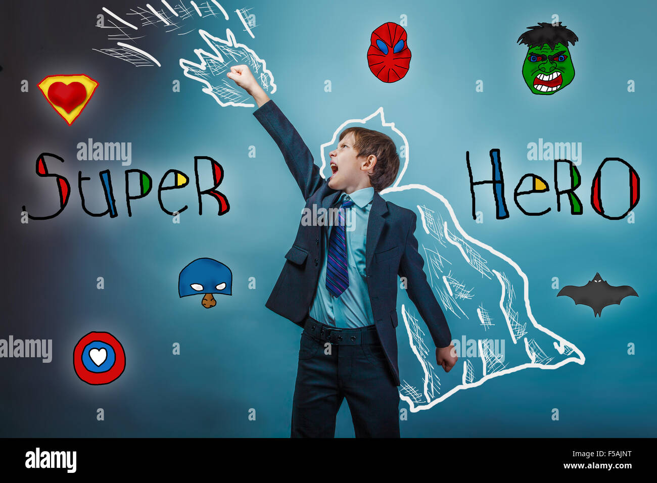 Il supereroe ragazzo ha sollevato le sue mani di superpotenza imprenditore battenti ph Foto Stock