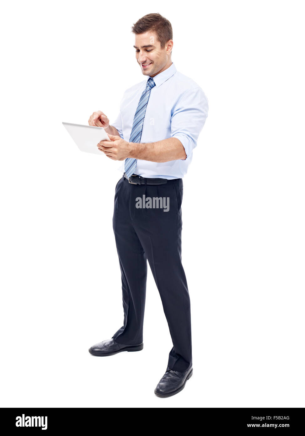 Caucasian corporate executive con computer tablet Foto Stock
