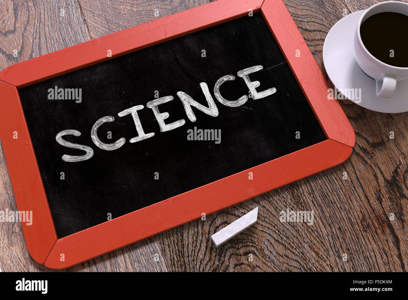La scienza manoscritte da bianco gesso su una lavagna. Foto Stock