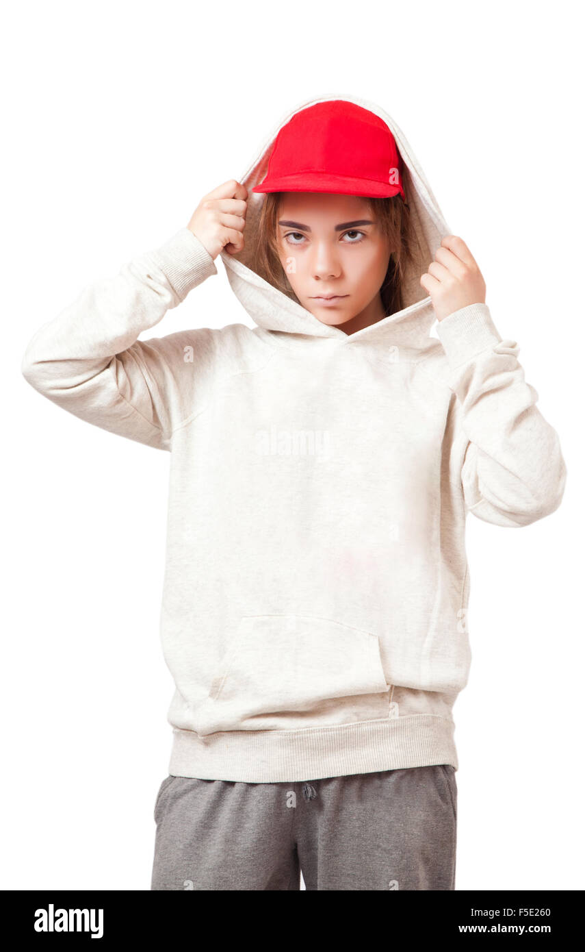 Un adolescente in un cappuccio rosso e sportswear, isolato Foto Stock
