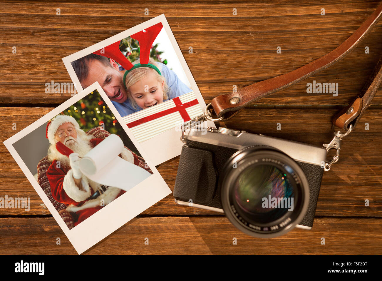 Immagine composita della foto istantanea sul pavimento in legno Foto Stock