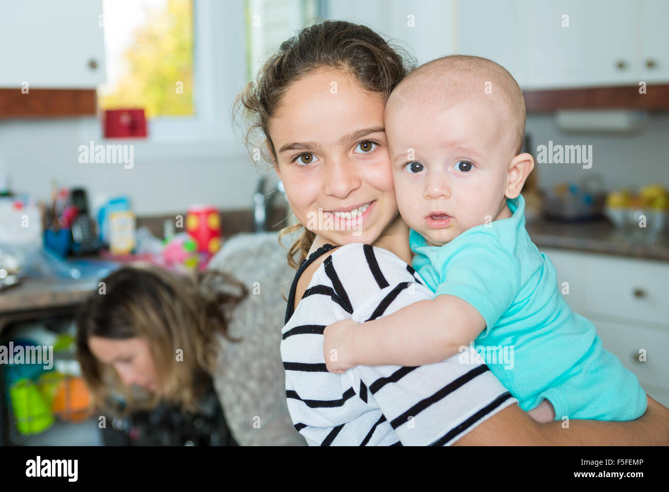 Famiglia in cucina Foto Stock