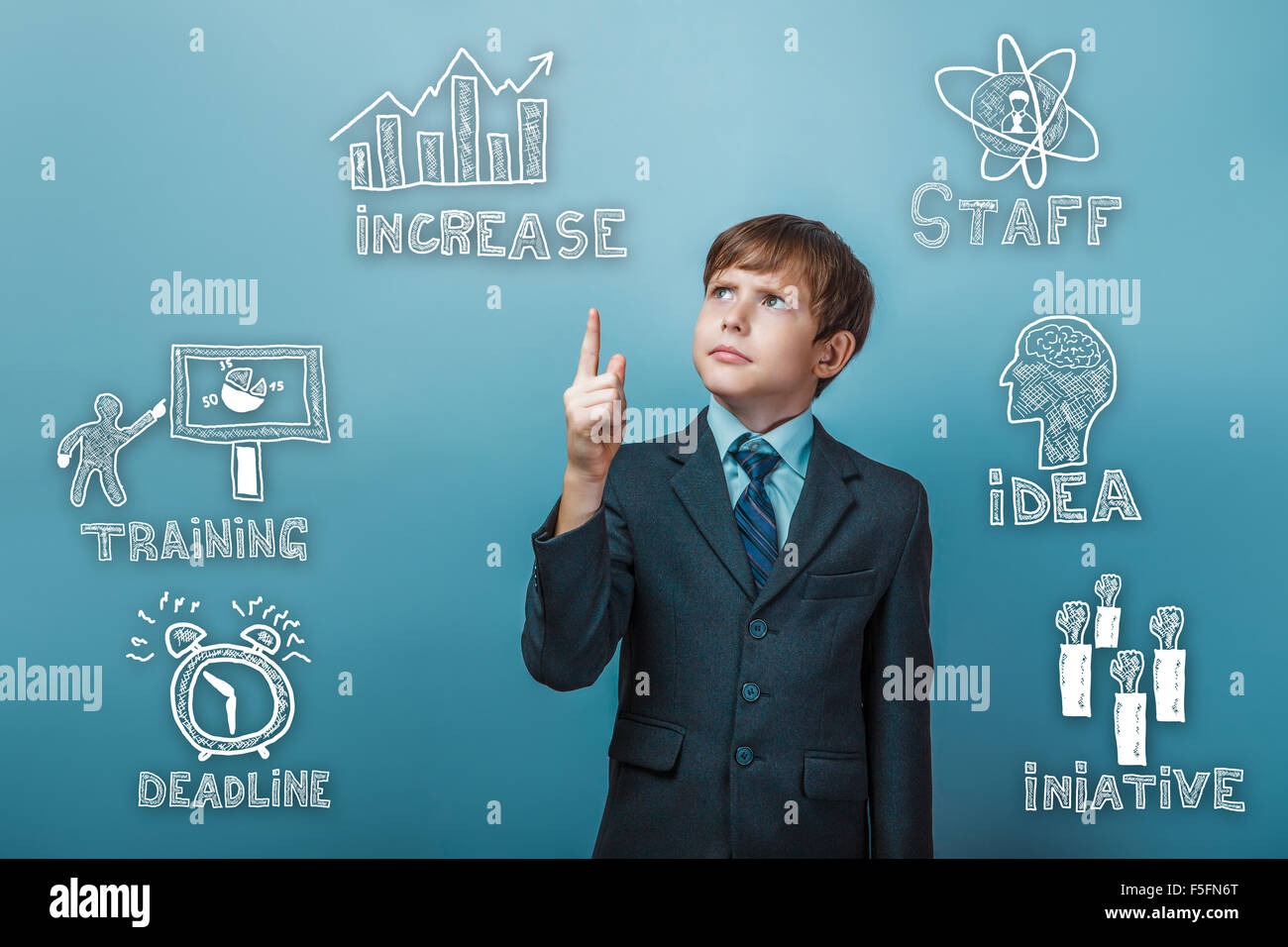 Imprenditore ragazzo adolescente punti a sketch set di icone business s Foto Stock