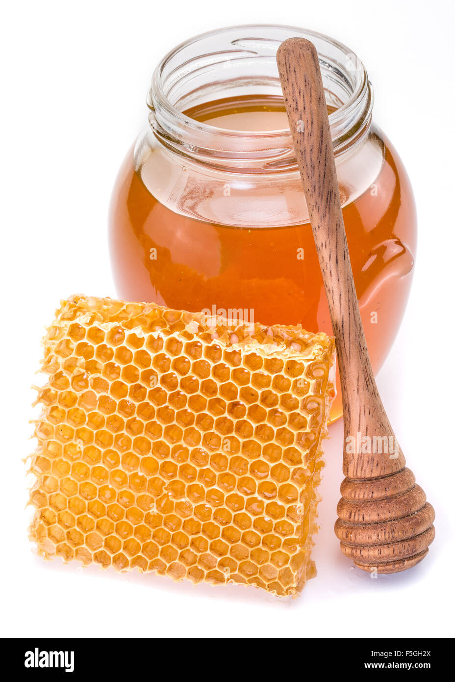 Vaso pieno di miele fresco e favi. Immagini di alta qualità. Foto Stock