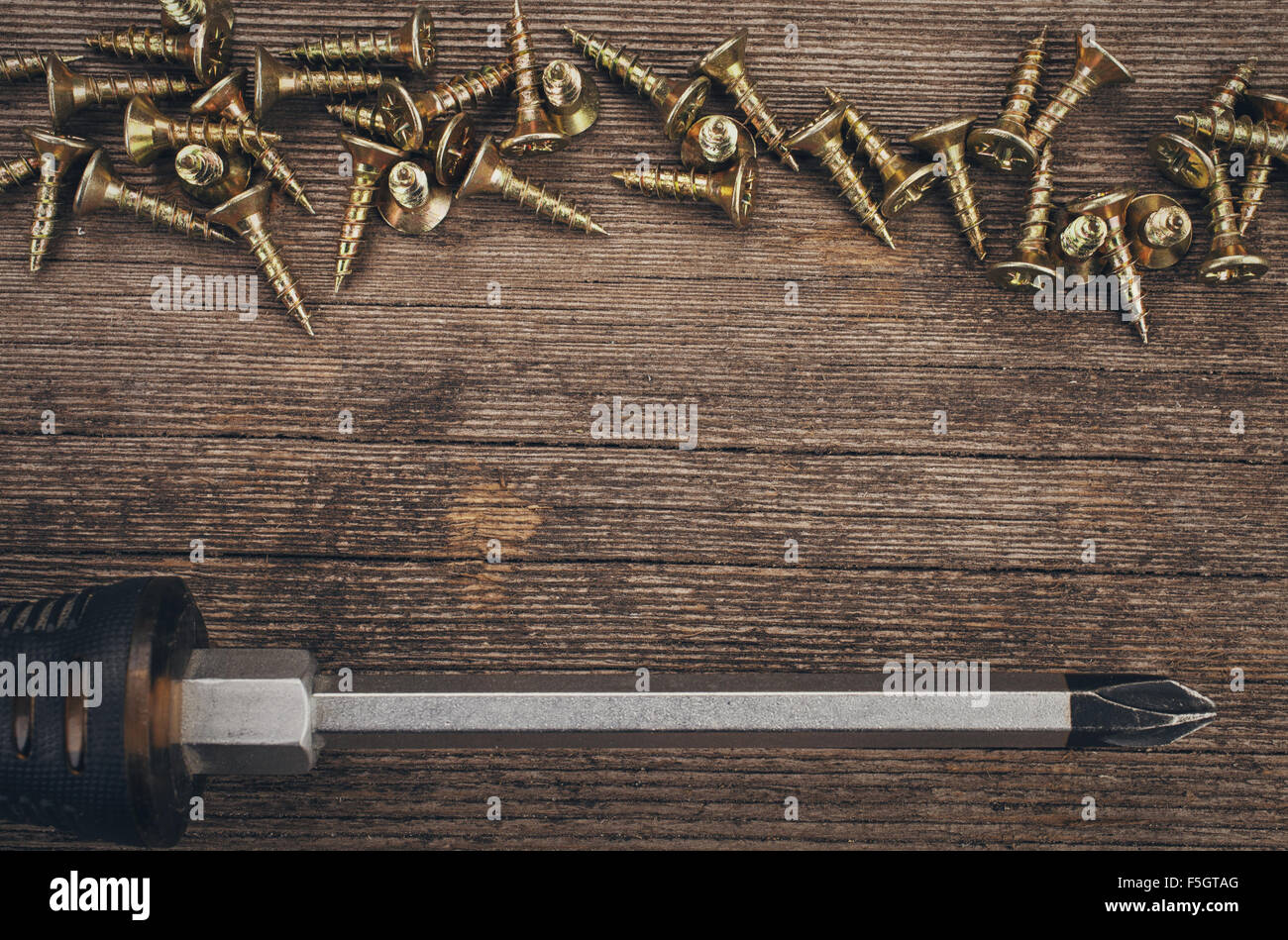 Cacciavite e viti Foto Stock