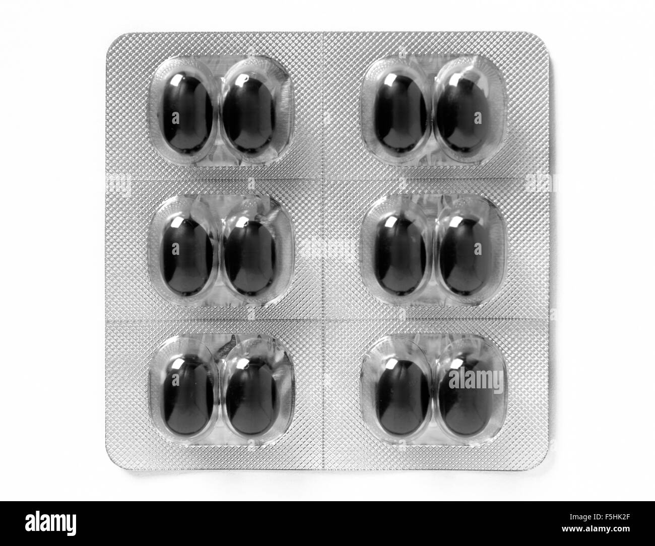 Contenitore blister con due pillole al giorno dose isolati su sfondo bianco Foto Stock