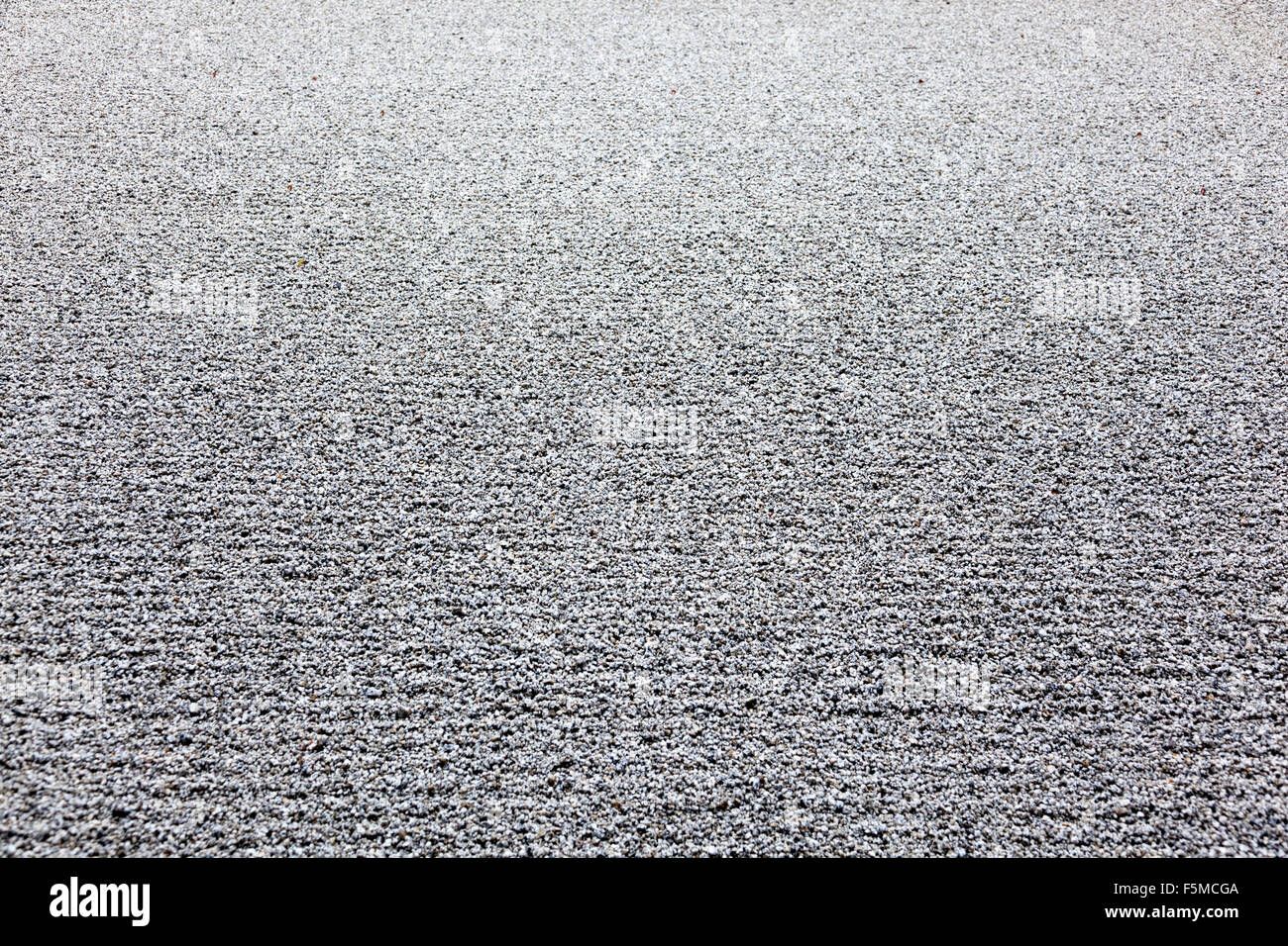 Rastrellata ciottoli presso il Tempio di Ryoanji, Kyoto, Giappone Foto Stock