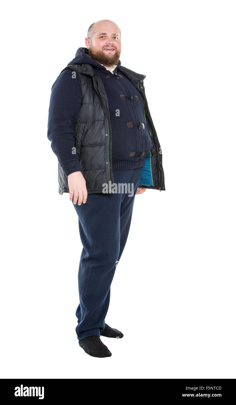 Jolly uomo grasso in un buio vestiti caldi, su sfondo bianco Foto Stock