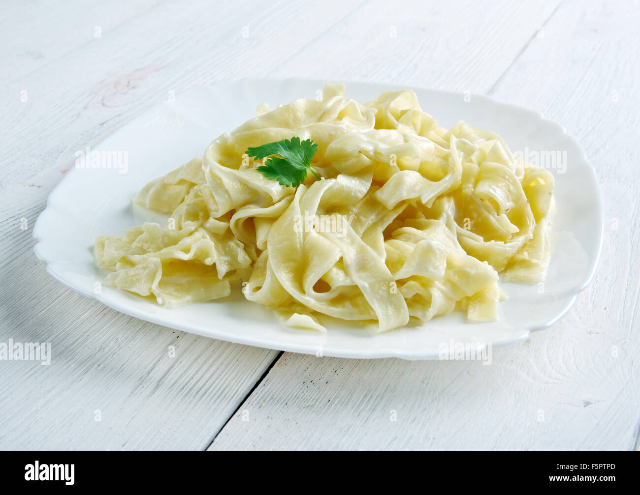 Pasta Fettuccine Alfredo con panna. close up Foto Stock