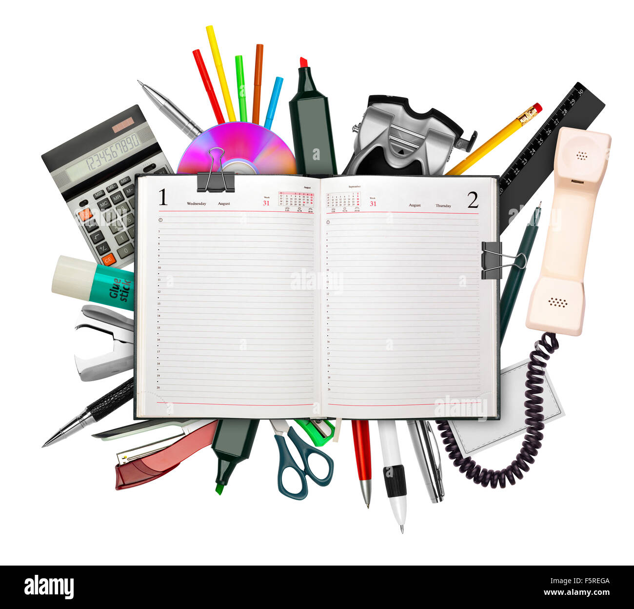 Serie di articoli di cartoleria con business diario sulla cima isolata su bianco Foto Stock
