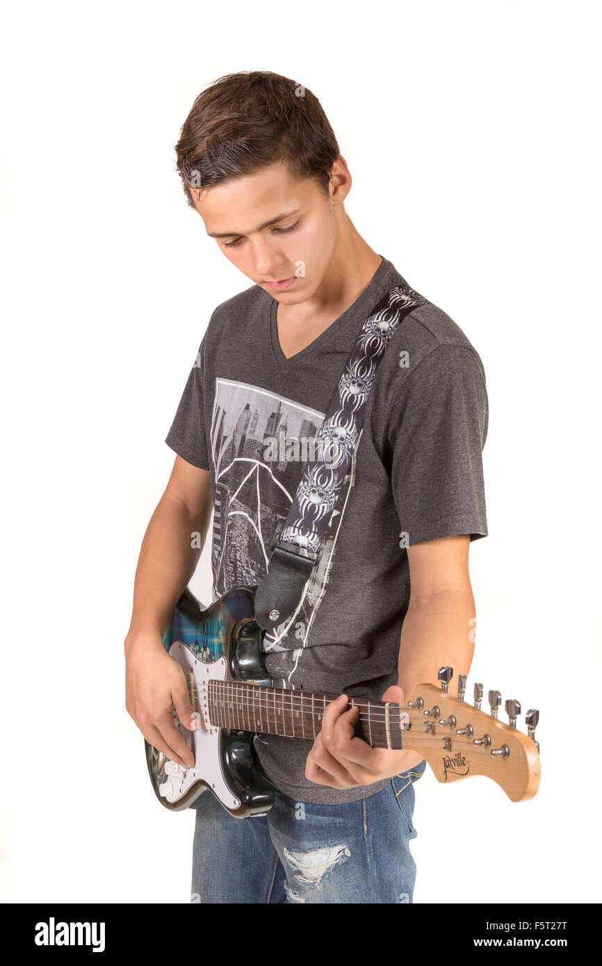 Ragazzo adolescente suonando una chitarra elettrica Foto Stock