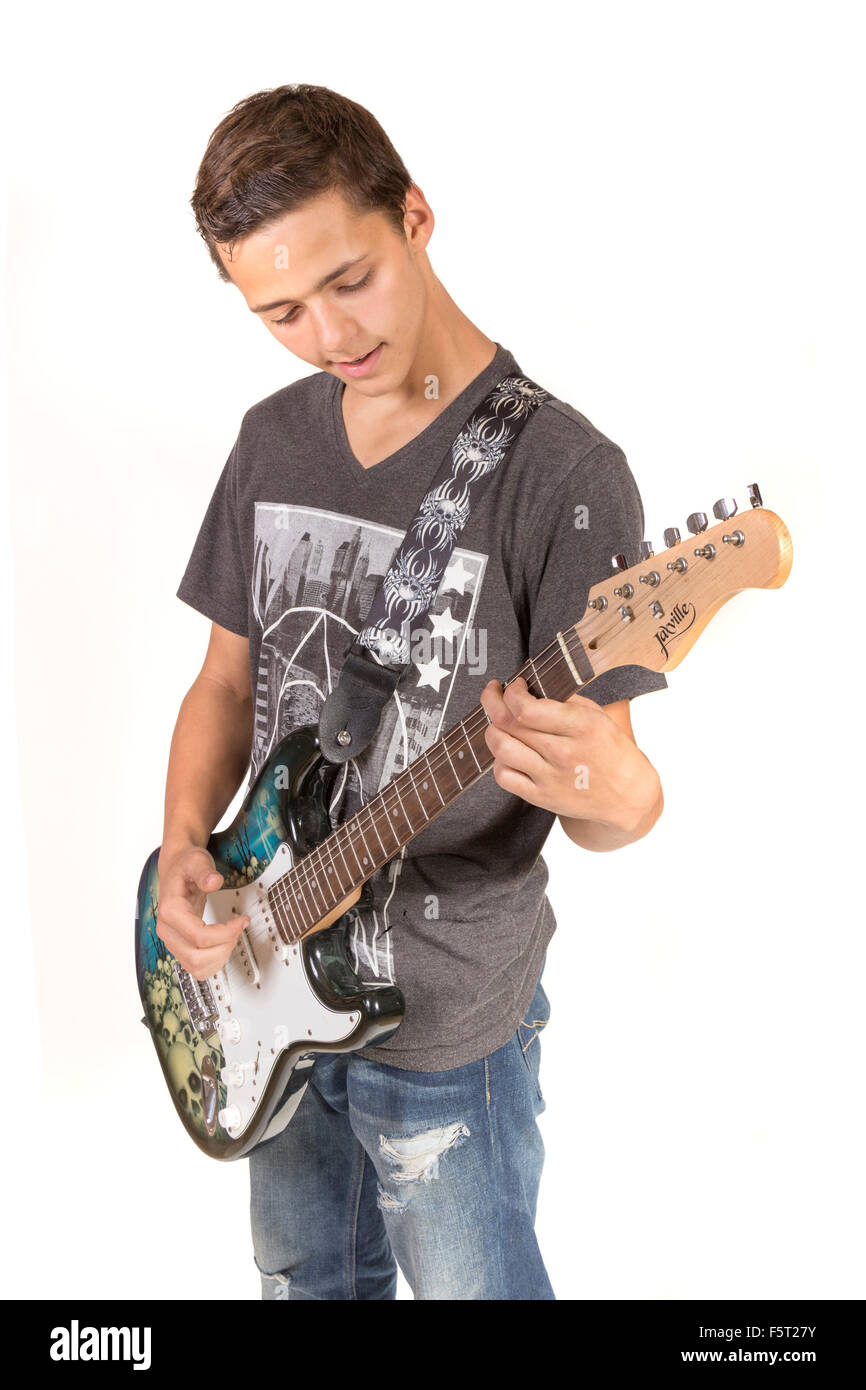 Ragazzo adolescente suonando una chitarra elettrica Foto Stock