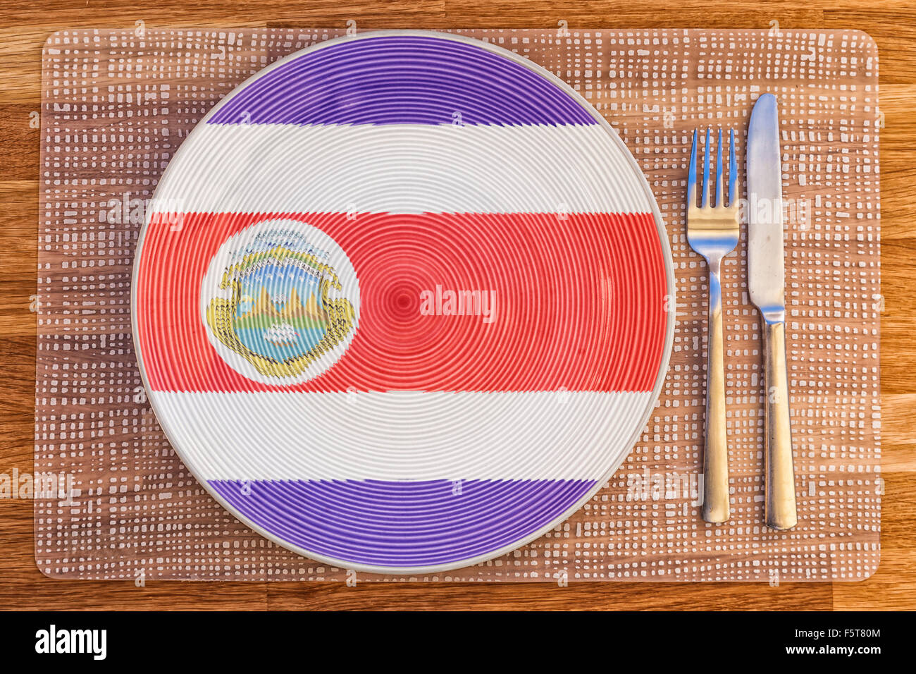 La cena la piastra con la bandiera della Costa Rica su di esso per il vostro cibo internazionale e bere i concetti. Foto Stock