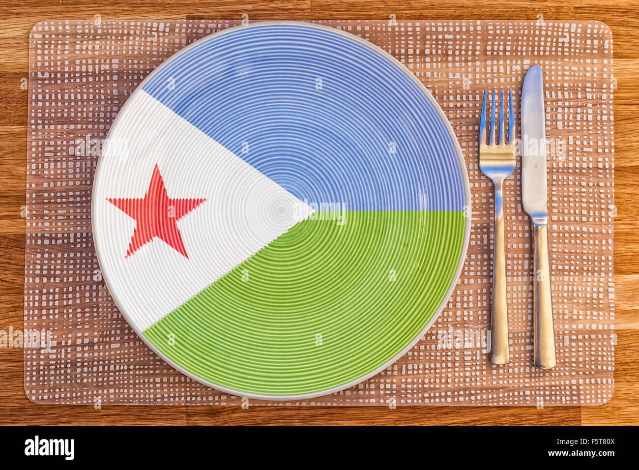 La cena la piastra con la bandiera del Gibuti su di esso per il vostro cibo internazionale e bere i concetti. Foto Stock
