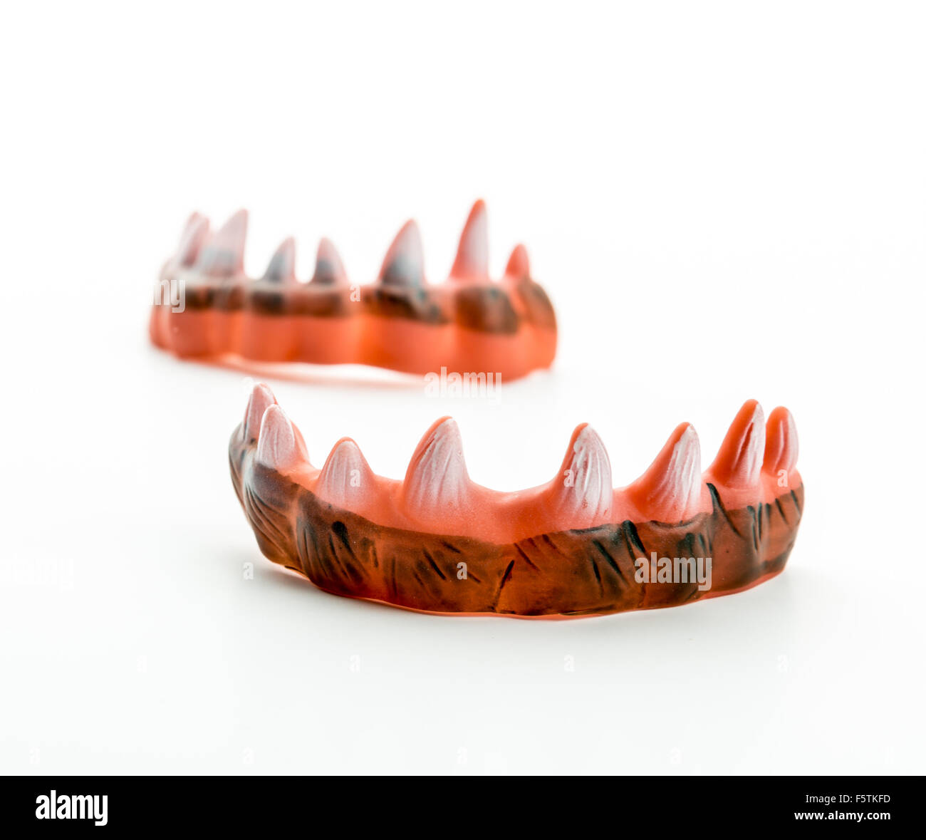 Monster brutto denti affilati isolato su bianco Foto Stock