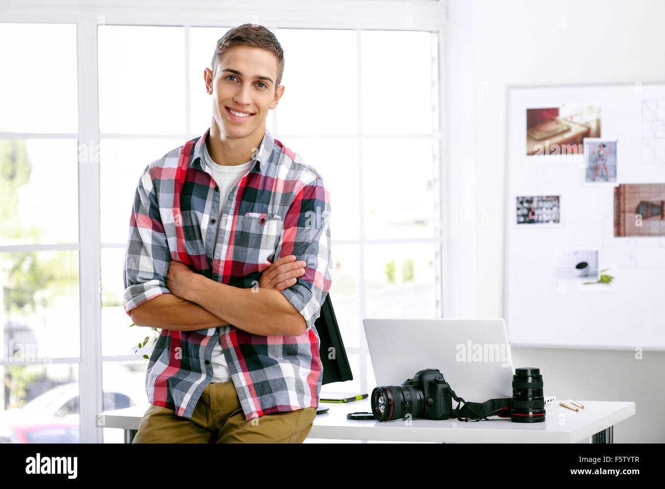 Concept per il fotografo professionista in office Foto Stock