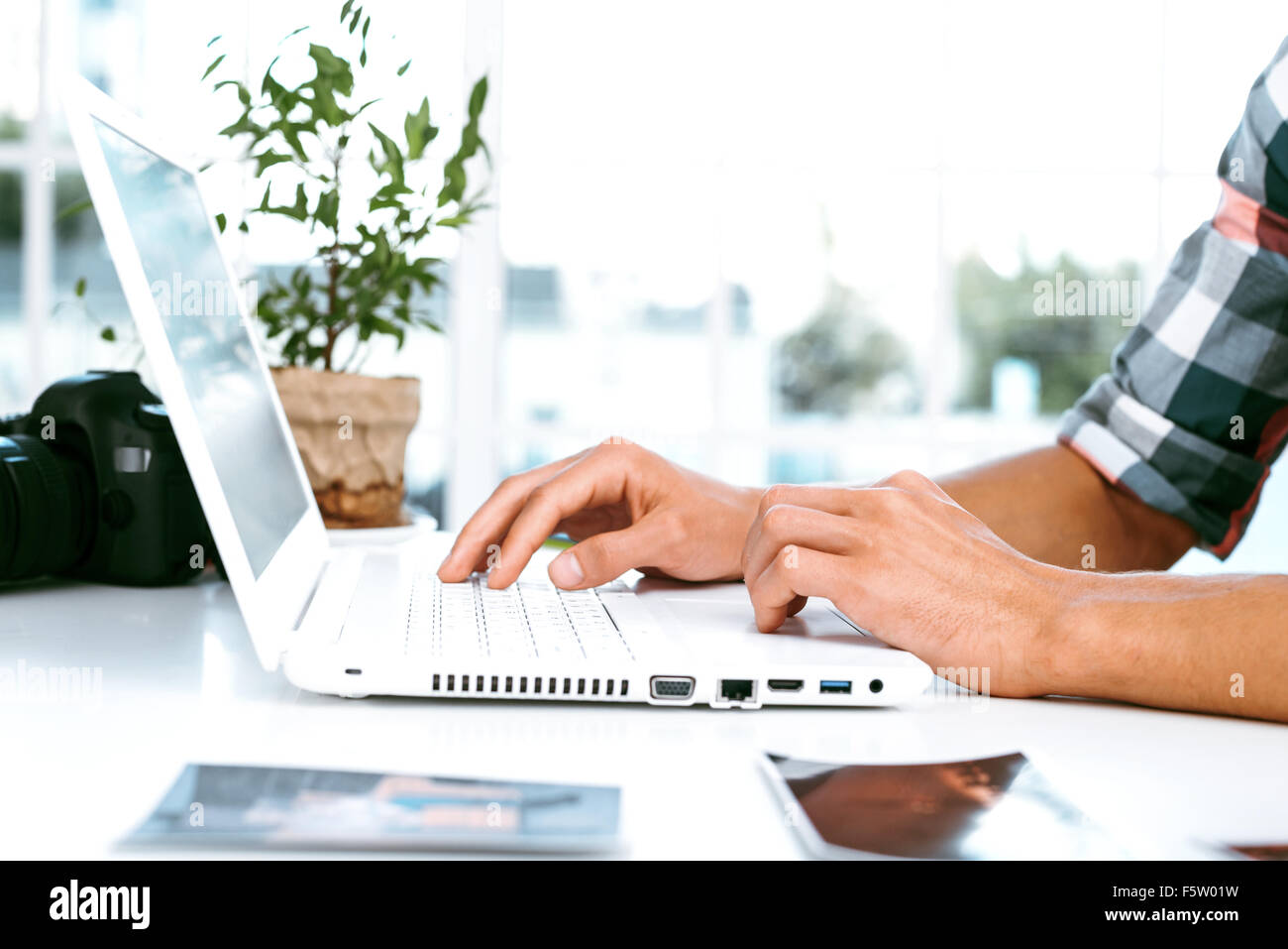 Concept per il fotografo professionista in office Foto Stock