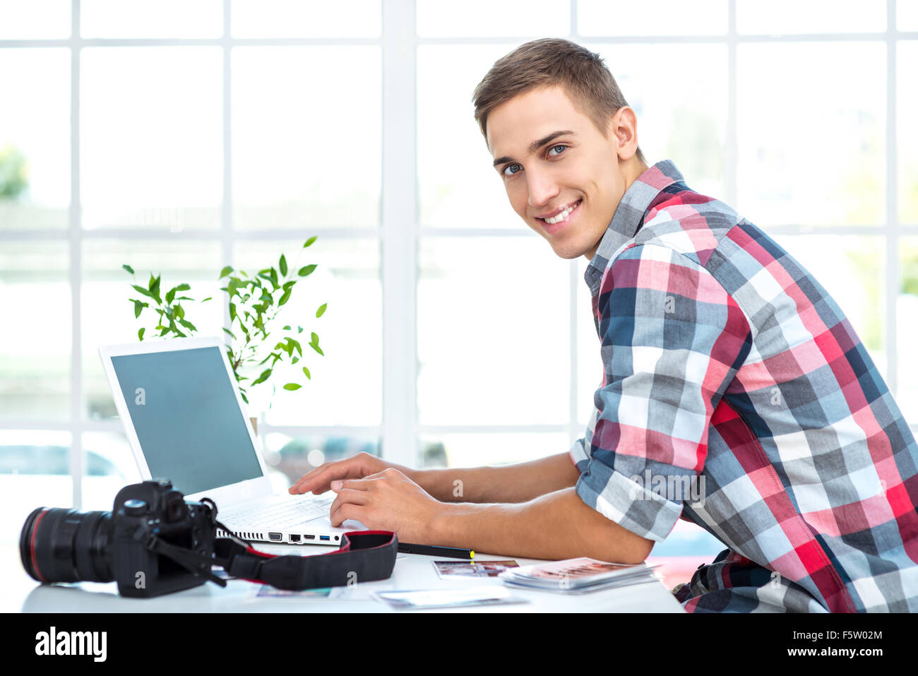 Concept per il fotografo professionista in office Foto Stock