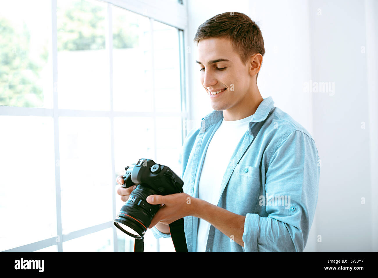 Concept per il fotografo professionista in office Foto Stock