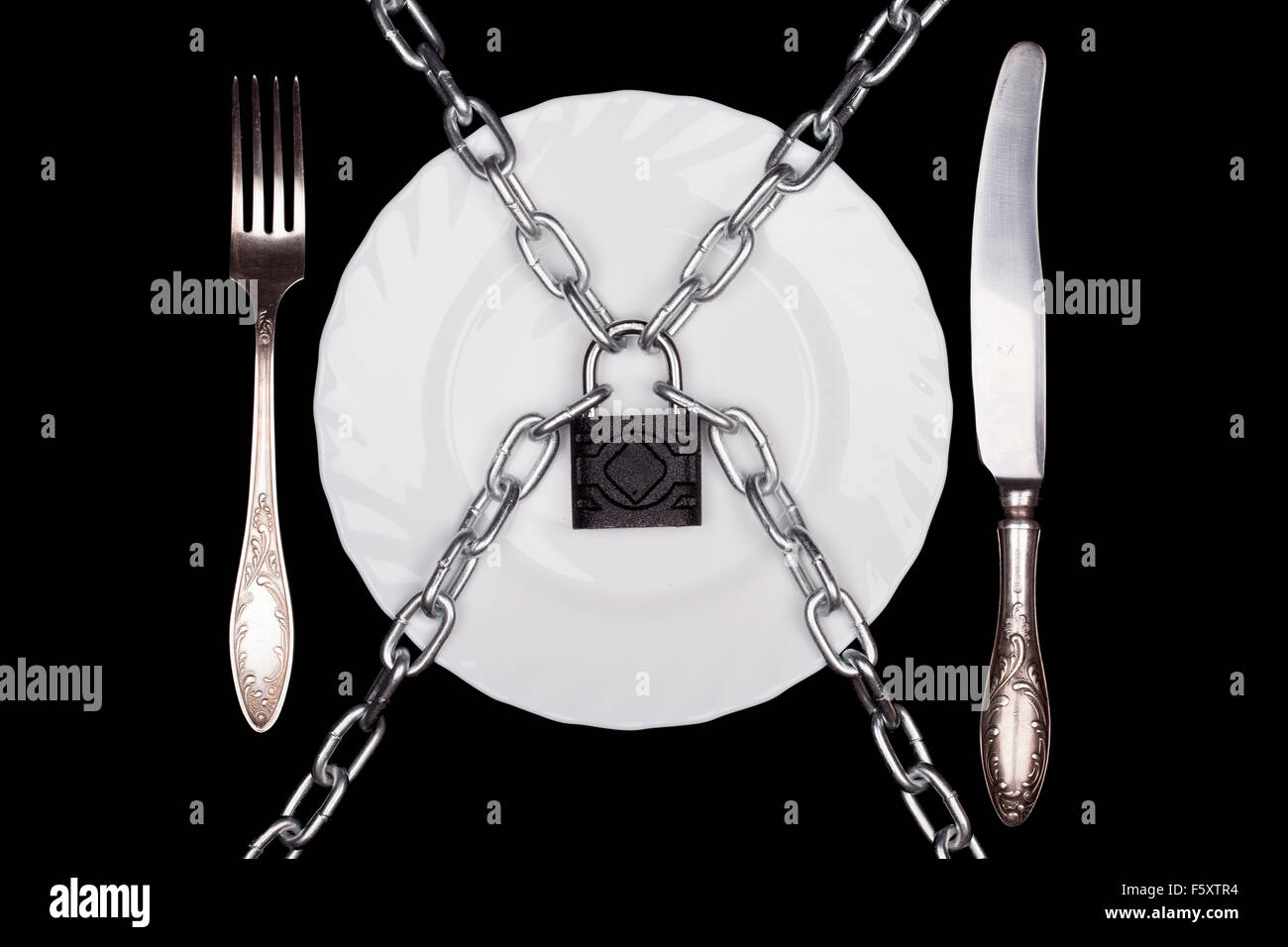 Piastra, lucchetto, simbolo di dieta, still life, vista dall'alto, isolato Foto Stock