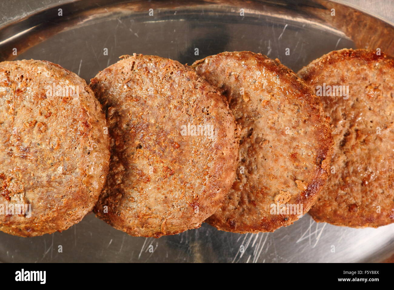 Fritte Burger polpetta di carne di manzo Foto Stock