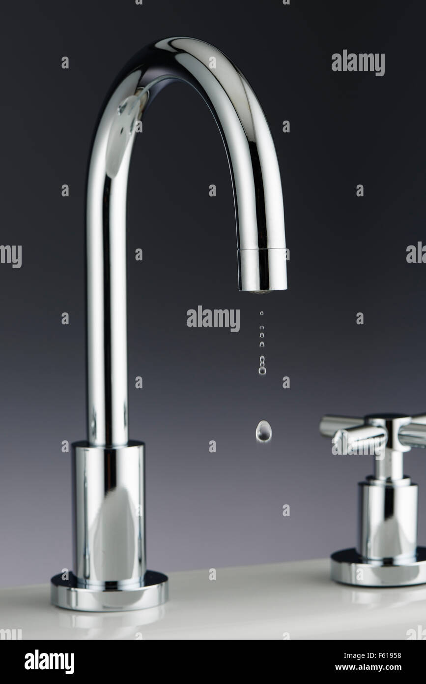 Toccare con il gocciolamento di acqua Foto Stock