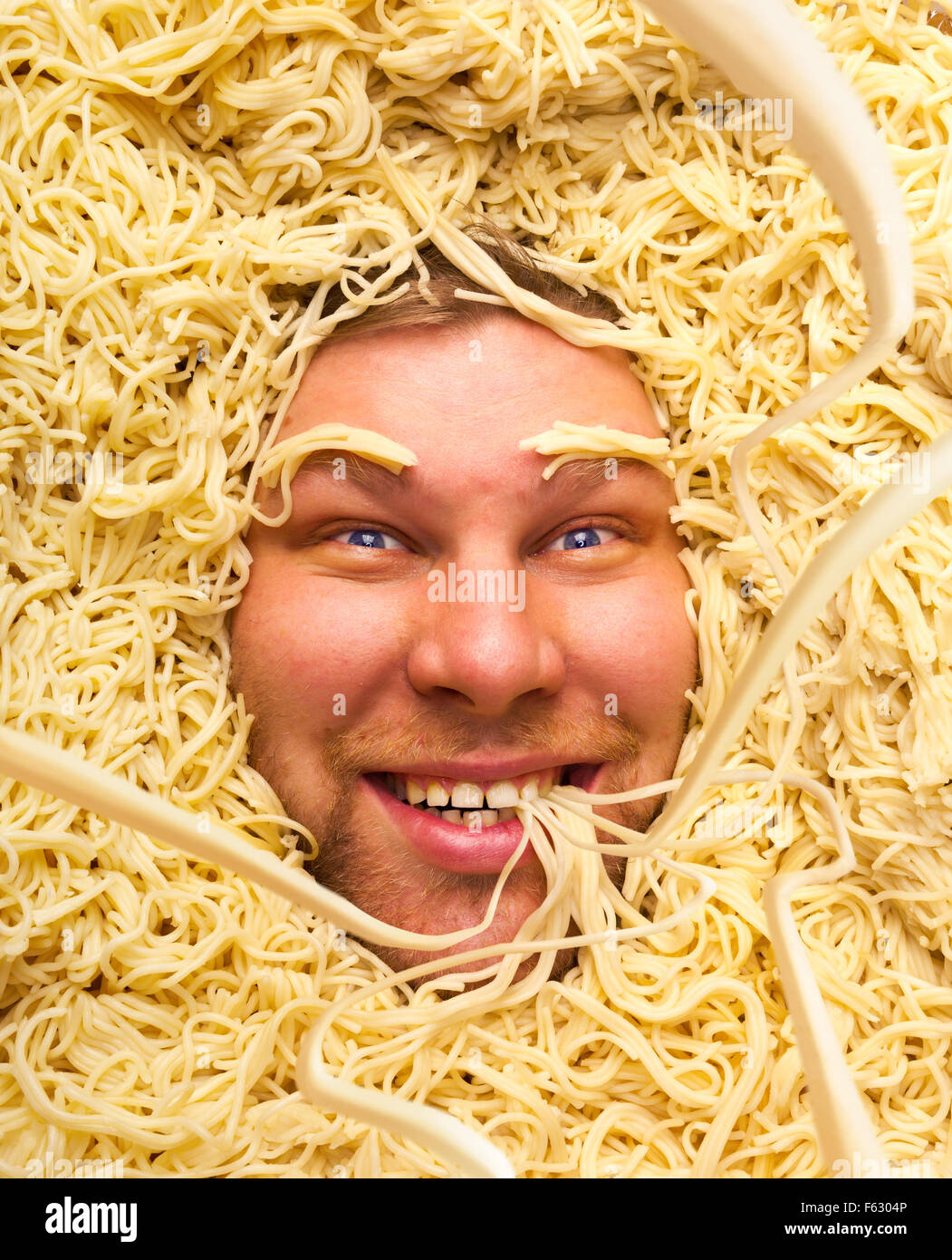 Faccia felice dell'uomo in pasta Foto Stock