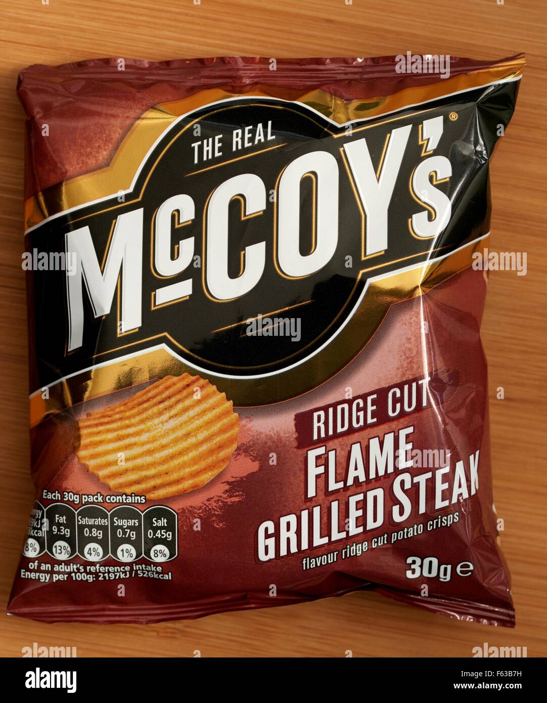 Il real Mccoys ridge taglia fiamma bistecca alla griglia patatine Foto Stock
