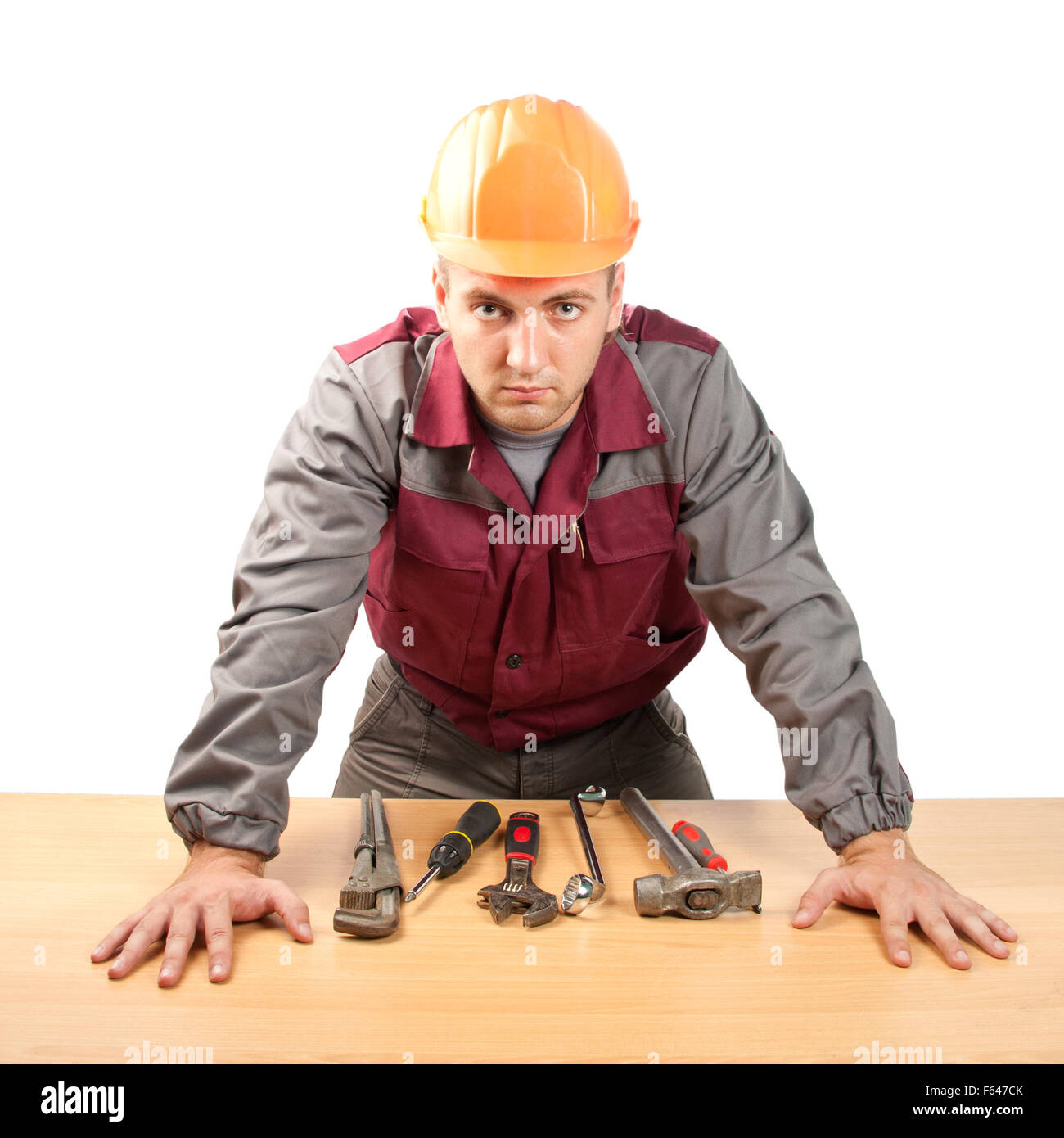 Uomo di lavoro con strumenti. Isolato su bianco Foto Stock