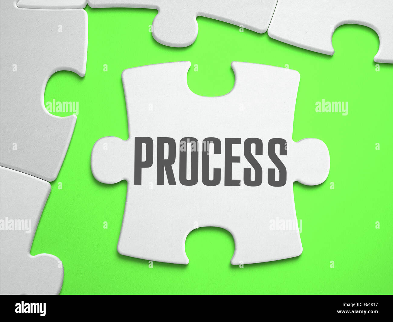 Processo - Puzzle con pezzi mancanti. Colore verde brillante background. Close-up. 3d'illustrazione. Foto Stock